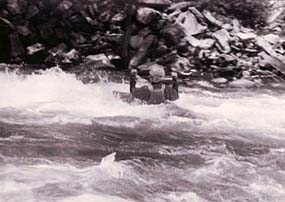 A kayaker fights his way up the Nantahala River. � Jim Johnson 