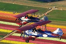 An open cockpit biplane ride over the flower fields. Courtesy of the Carlsbad Convention & Visitors Bureau 
