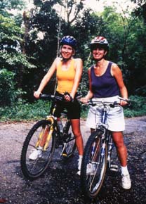 After mountain biking straight up four miles, Jane Watkins and Sharon Spence take a breather. � 2000 Warren Lieb. 