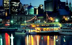 The Old Port of Montr�al and downtown buildings. � Canadian Tourism Commission, Pierre St-Jacques.