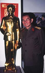 Army guard poses with Ho. Copyright Victoria Brooks.