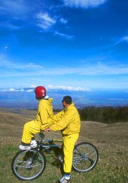Biking along a dormant volcano. Copyright Milton Fullman. 