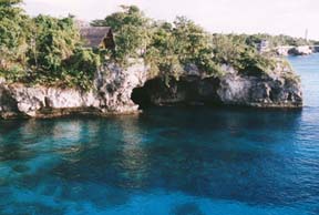 The reefs of Negril are visible beneath the transparent blue of the Caribbean. Copyright Victoria Brooks.