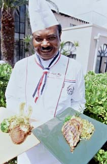 Chef Ming, voted Bermuda's Best Chef of 1999, displays his culinary masterpieces. Copyright Warren Lieb.