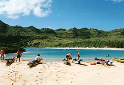 Copyright Jim Johnson. When the winter seas are too rough to visit the Na Pali coast, kayak tours visit the 