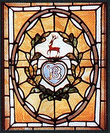 Used with permissions. A stained-glass window depicting the Boldt family coat of arms.