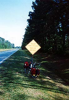 Copyright Tyson Brooks. Though Tyson did not find any bicycle signs, he did find one that reads 'Caution: Tanks Crossing Roads Day and Night.'