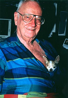Sir Arthur C. Clarke, sahib of science fiction and serendipity, relaxes in his Colombo home with his one-eyed Chihuahua, Pepsi. Copyright: Victoria Brooks.