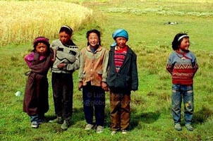 Local children, clearly delighted. Copyright: Lucy Moss. 
