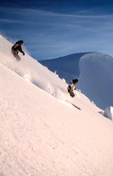 A night in a mountaintop snowcave might be the best way to guarantee perfect powder in the morning. Photo courtesy of Tourism BC.
