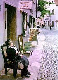 The arts distict in Augsburg�s Old City offers a cobblestone collection of quirky shops. Copyright: Jim Johnson.