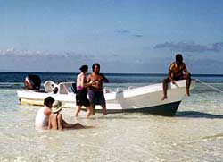 Paradise found: A sandbar between two small islands offers the perfect resting spot during a snorkeling trip. Copyright Jim Johnson.
