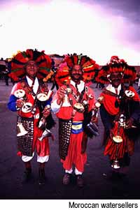 Moroccan watersellers.Jemaa el Fna, Marrakech, Morocco. �Paris Permenter and John Bigley