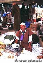 Moroccan spice seller. Paris Permenter & John Bigley