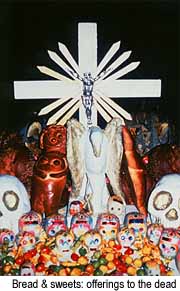 Offerings to the dead include pan de muerto, fruit and sweets in the shape of skulls. Courtesy of the Mexican Government Tourist Office