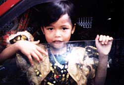 Malacca girl! Copyright Victoria Brooks.