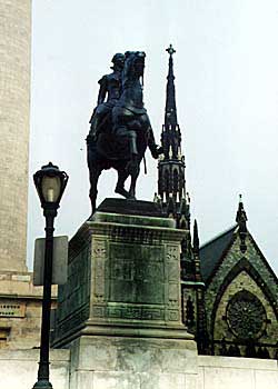 Statue of George Washington on Charles Street in Baltimore. The statue and monument to the left are part of an early effort to beautify one of America's oldest cities. Copyright Eric Miller 
