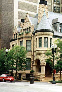 Victorian house in Chicago. Carefully restored, the street has also been recently landscaped with trees and shrubs. Copyright Eric Miller 