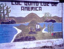 A sign in Quito, Ecuador, begs that the Galapagos Islands be eternally protected. Copyright Sharon Lloyd Spence, 1999.