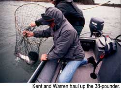 Kent and Warren haul up the 38-pounder. � Warren Lieb, 1999